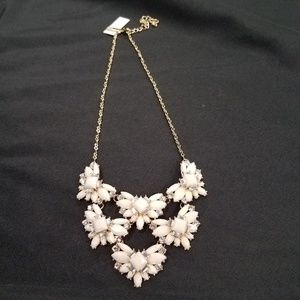 NWT: white floral bib style necklace.